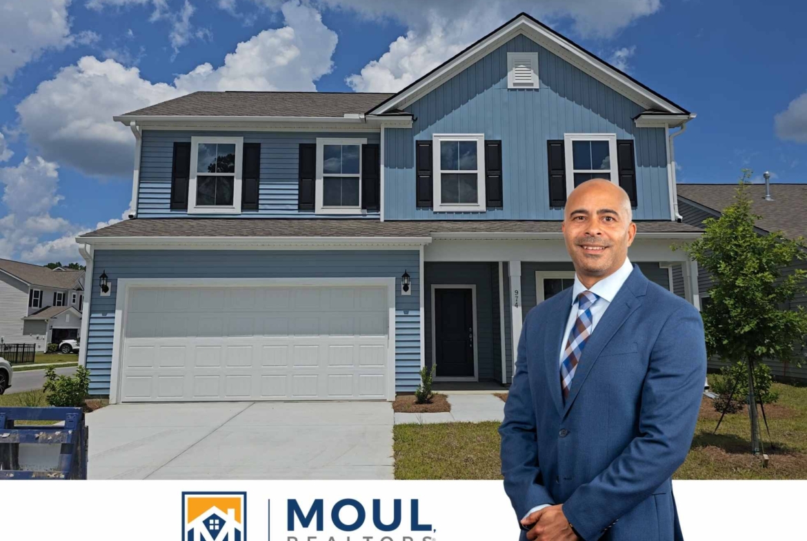 974 Danner Dr - Agent in front of property