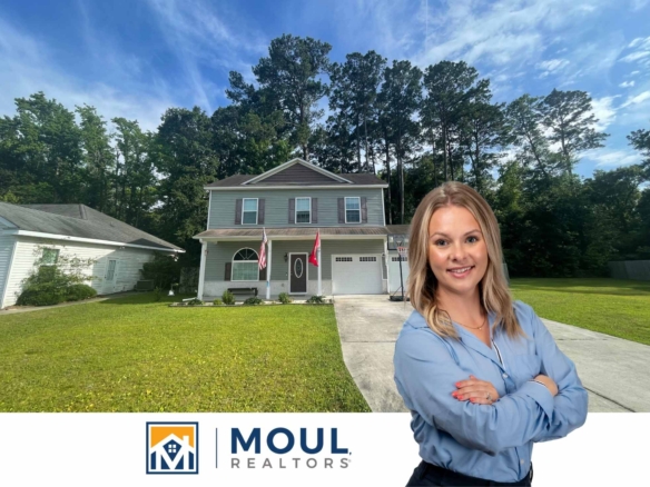49 Wintergreen - Agent in front of property