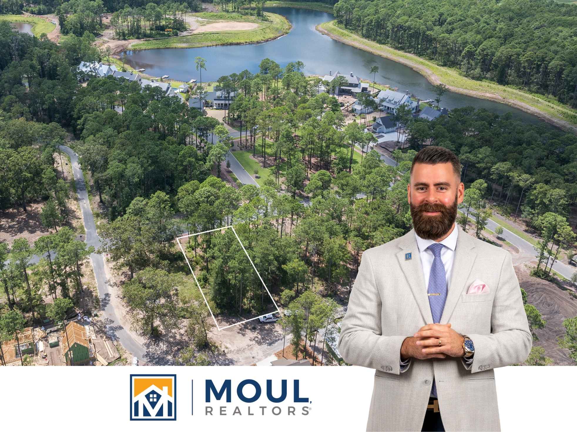 Agent in front of aerial view of lot