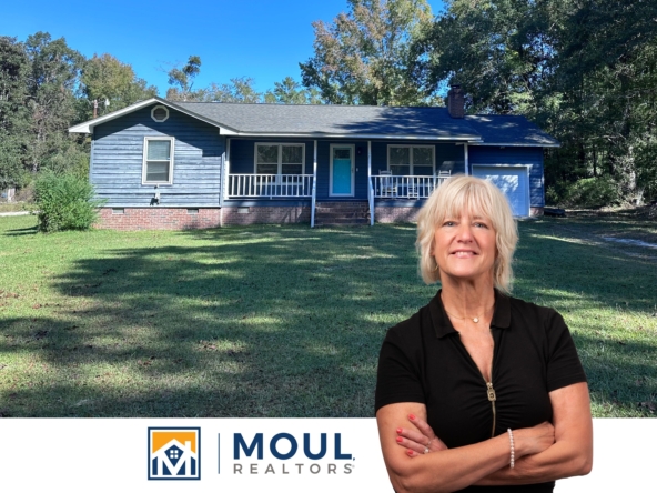 101 Jeanette - Agent in Front of Property