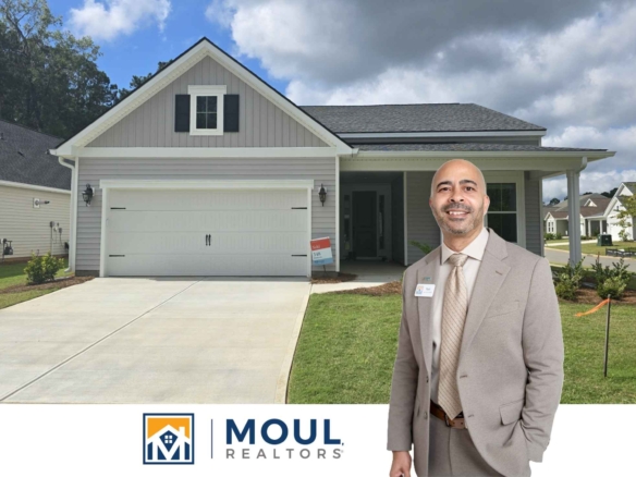 76 Estuary - agent in front of property