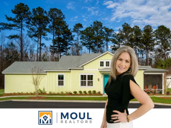 513 Tropics Ave - agent in front of model home