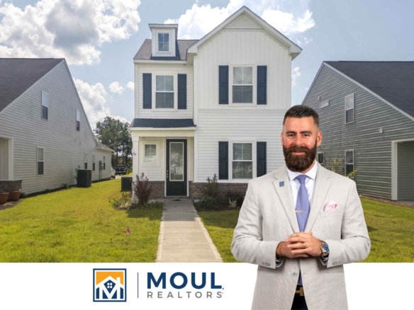 69 Garden Gate Ln - Agent in front of property