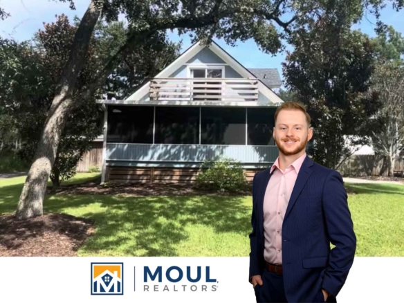 6589 Thomas Lawton - Agent in front of property